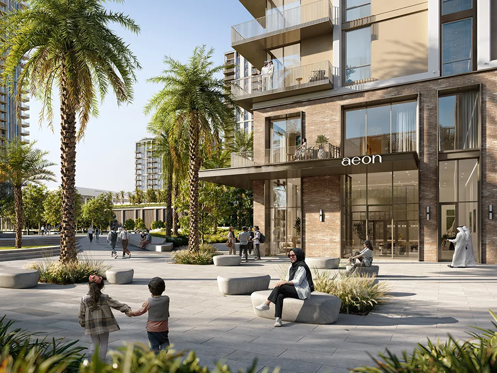 Aeon at Dubai Creek Harbour — official still of the brick lobby with the aeon sign over the door