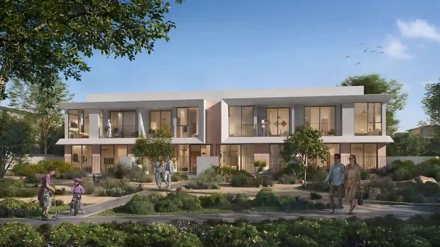 Alva at The Valley — street-level marketing still of townhouse façades and landscaped paths