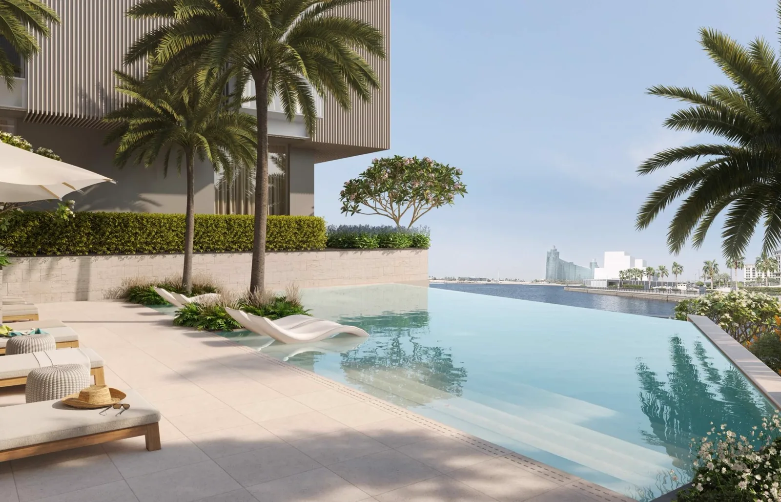 Art Bay by Ellington — official marketing still of the infinity pool deck looking toward Dubai Creek
