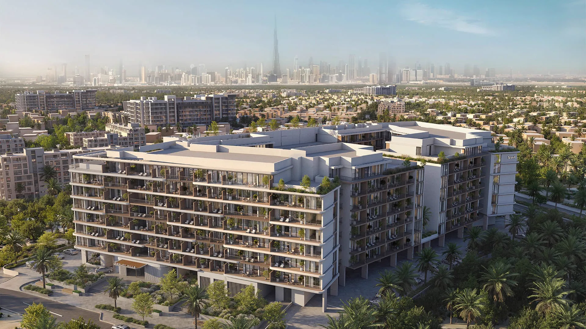Ashley Hills — official aerial of the two connected low-rise masses with ASHLEY HILLS on the street face and TownX on the far wing