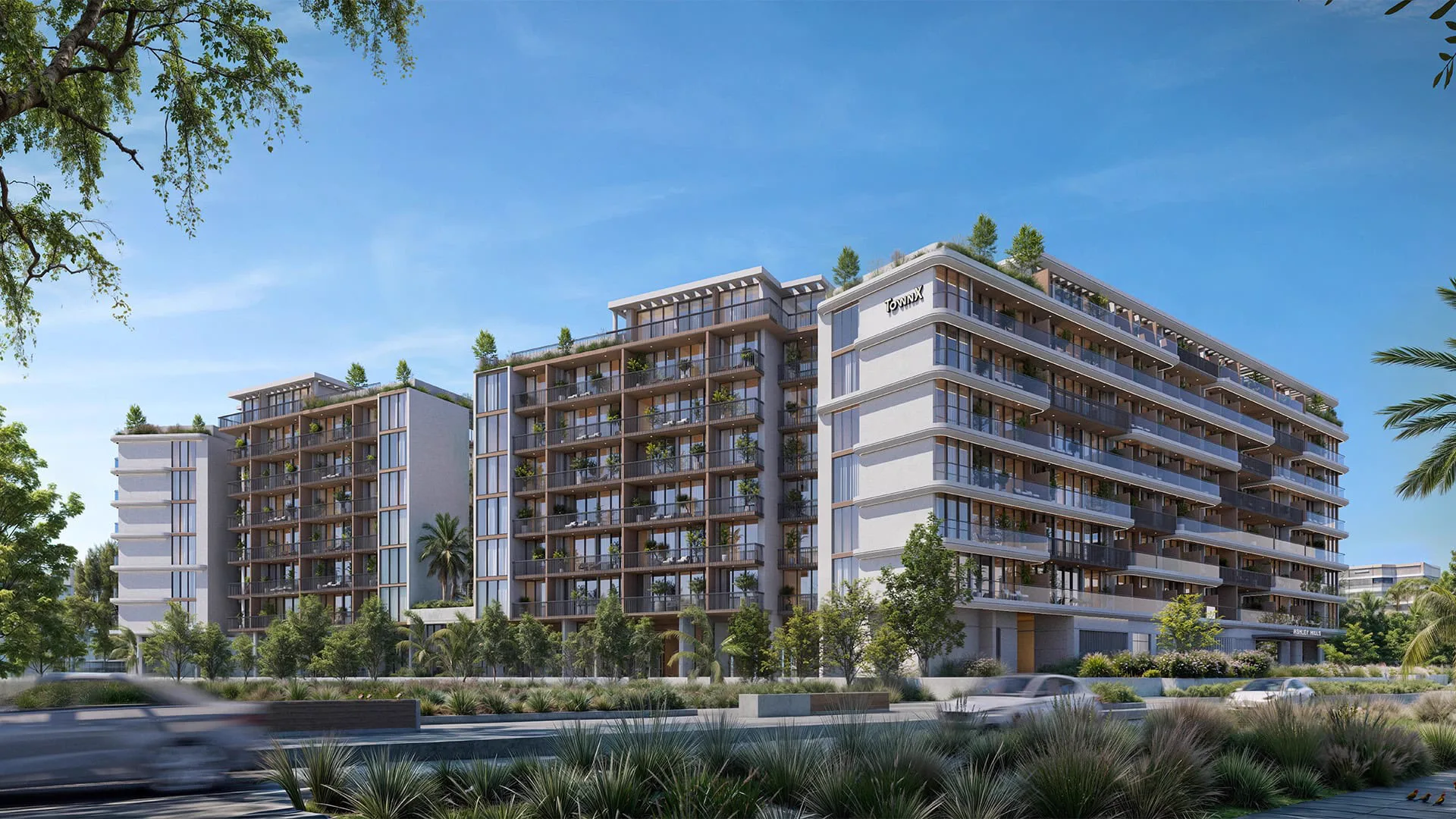 Ashley Hills — official street still of the TownX-crowned wing and neighbouring stacked-balcony mass