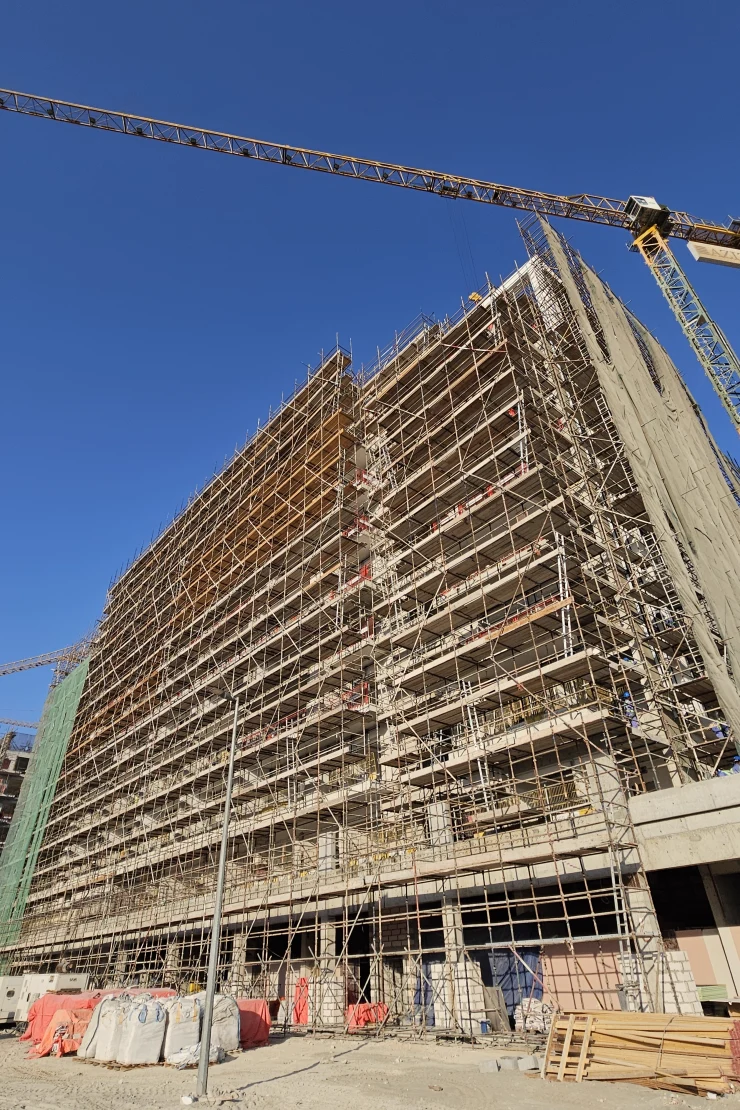 Azizi Riviera 55 — October 2024 scaffold and slab photo from street level