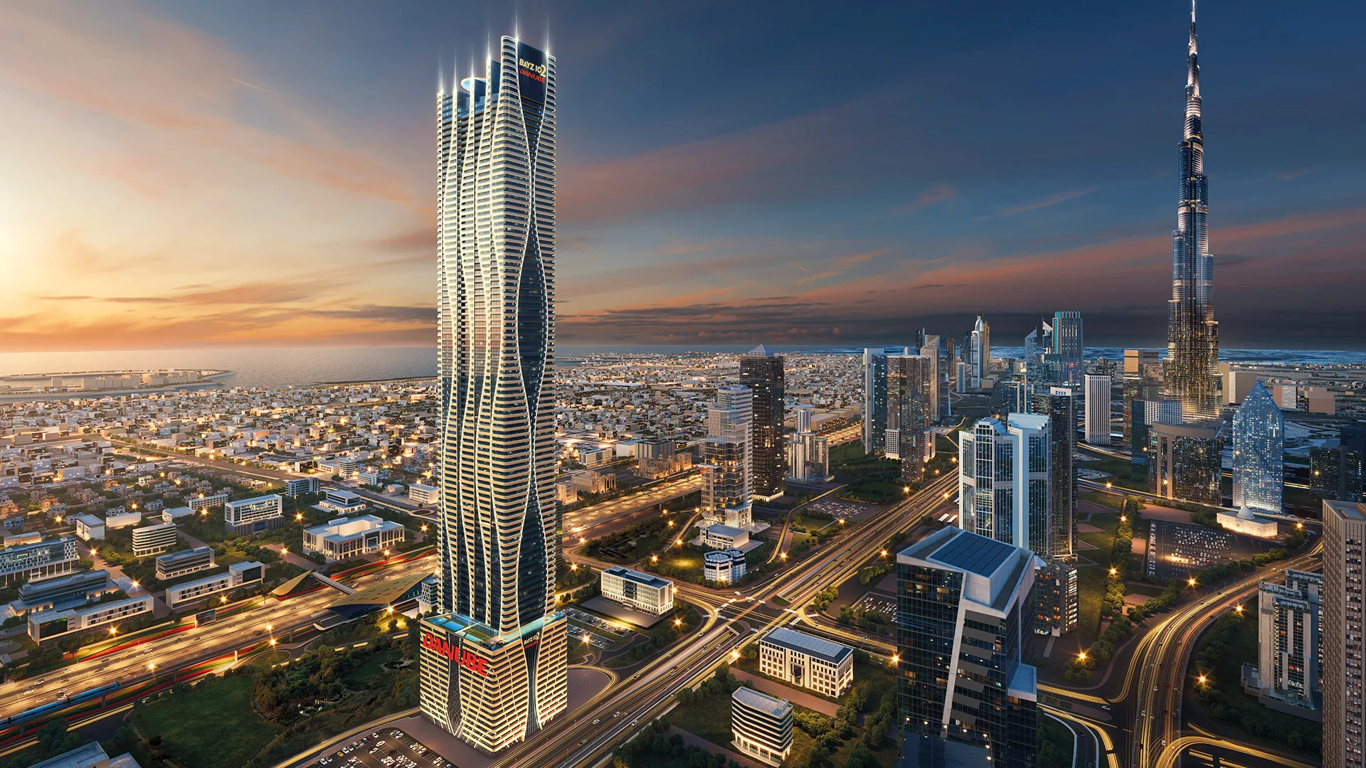 Bayz 102 — official dusk aerial CGI with BAYZ 102 on the crown and DANUBE on the podium, Burj Khalifa to the right