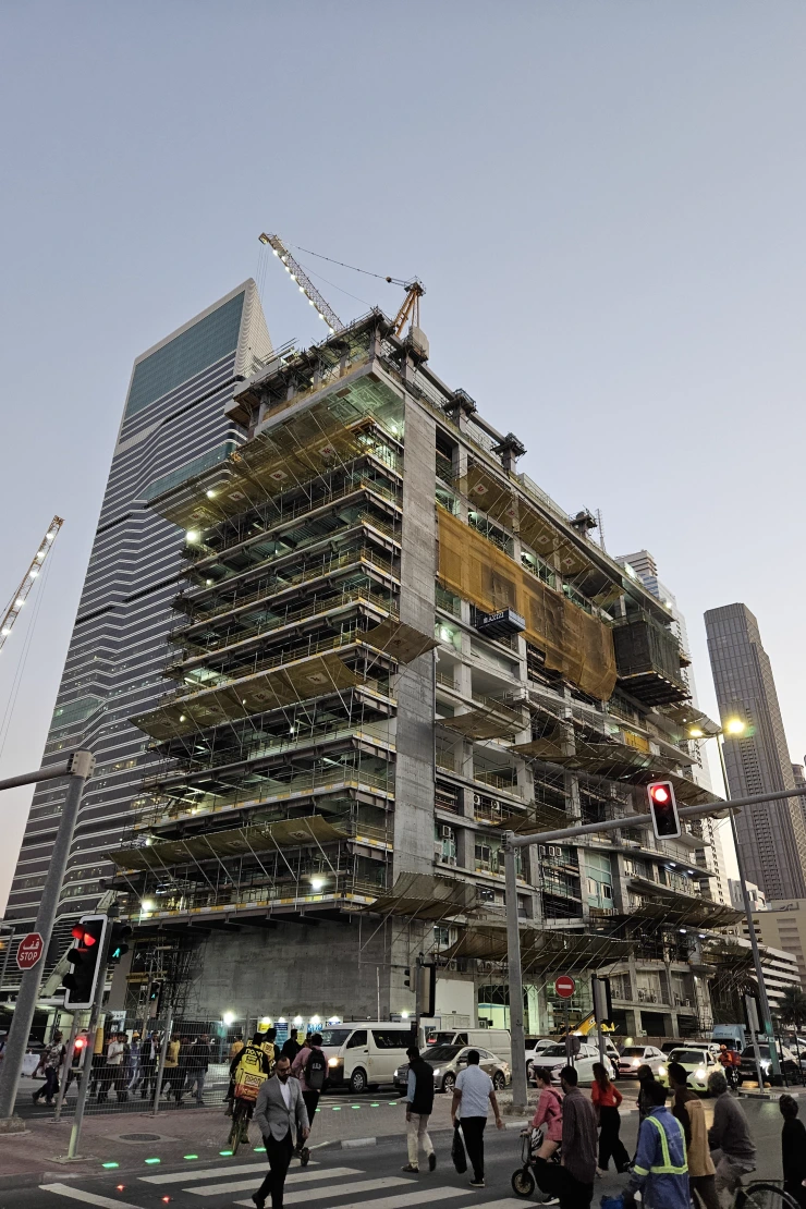 Burj Azizi — Propsearch January 2026 site photo of the podium and car-park stack on Sheikh Zayed Road, not the finished shaft