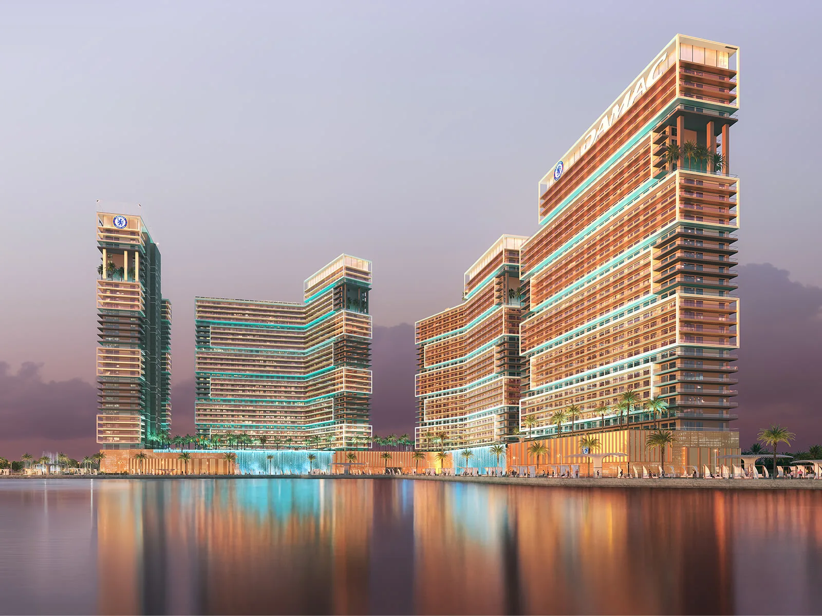 Official DAMAC Chelsea Residences dusk waterfront campus still — campus marketing, not a single tower ID