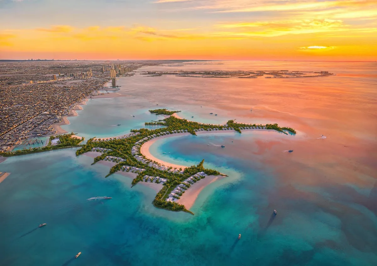 Naïa Island Dubai marketing still — island residential masterplan context at sunset