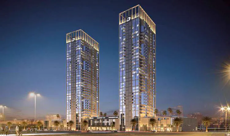 DAMAC Maison Privé — twin towers at night marketing image