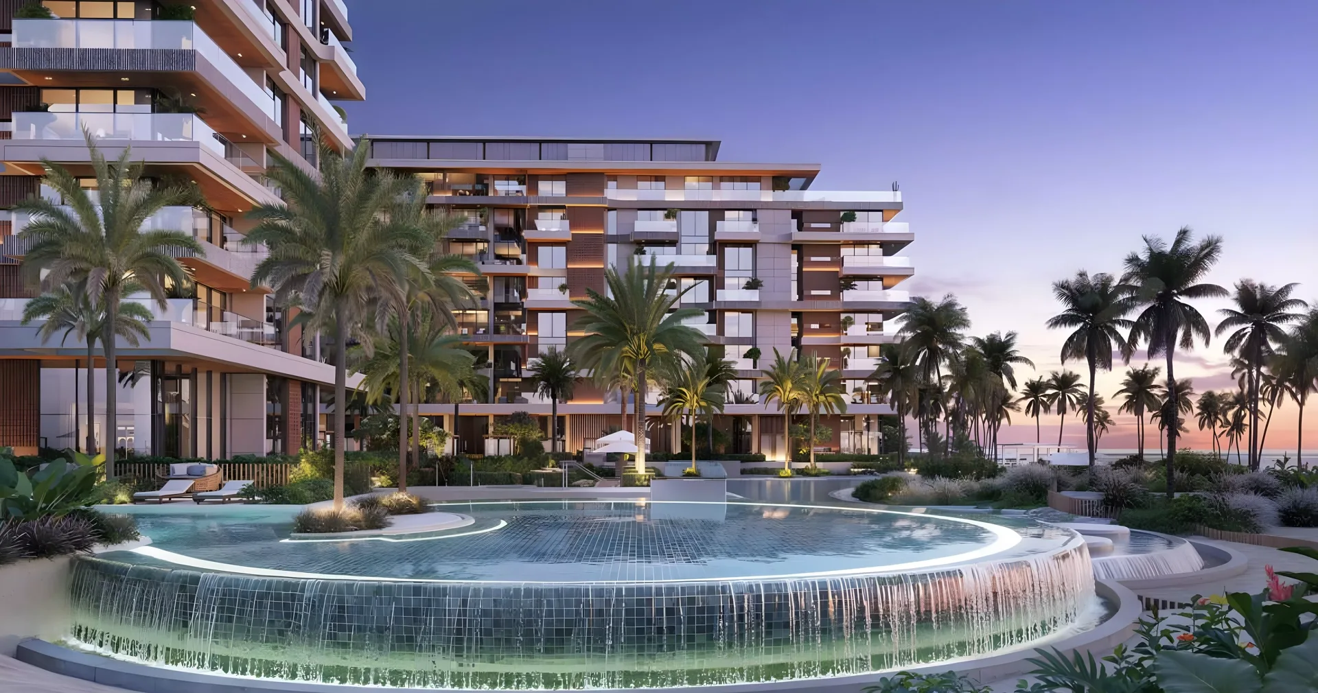 Leftover Property Finder Sands Phase 2 dusk still of the circular waterfall pool and lit terrace