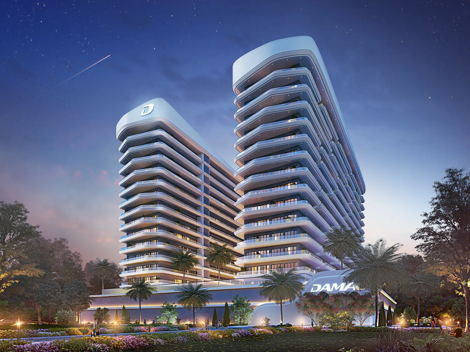ELO 3 at DAMAC Hills 2 — official DAMAC night exterior of the twin-wing apartment with lit balconies