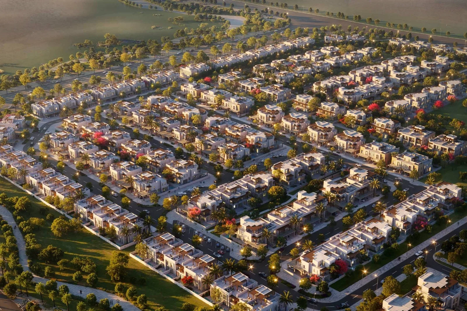Hayat Dubai South — marketing dusk aerial of low-rise townhouse streets