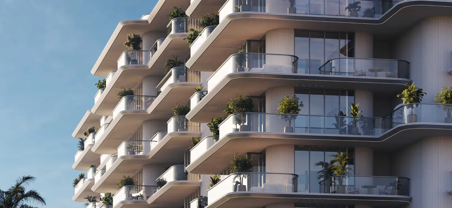 Le Château Piétrus — curved balcony facade detail with planters