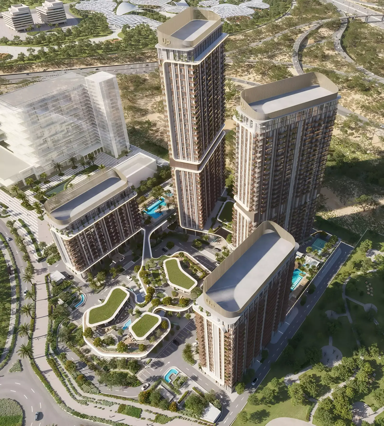 Mirdad by Union Properties — daytime aerial marketing still of four residential towers and central podium