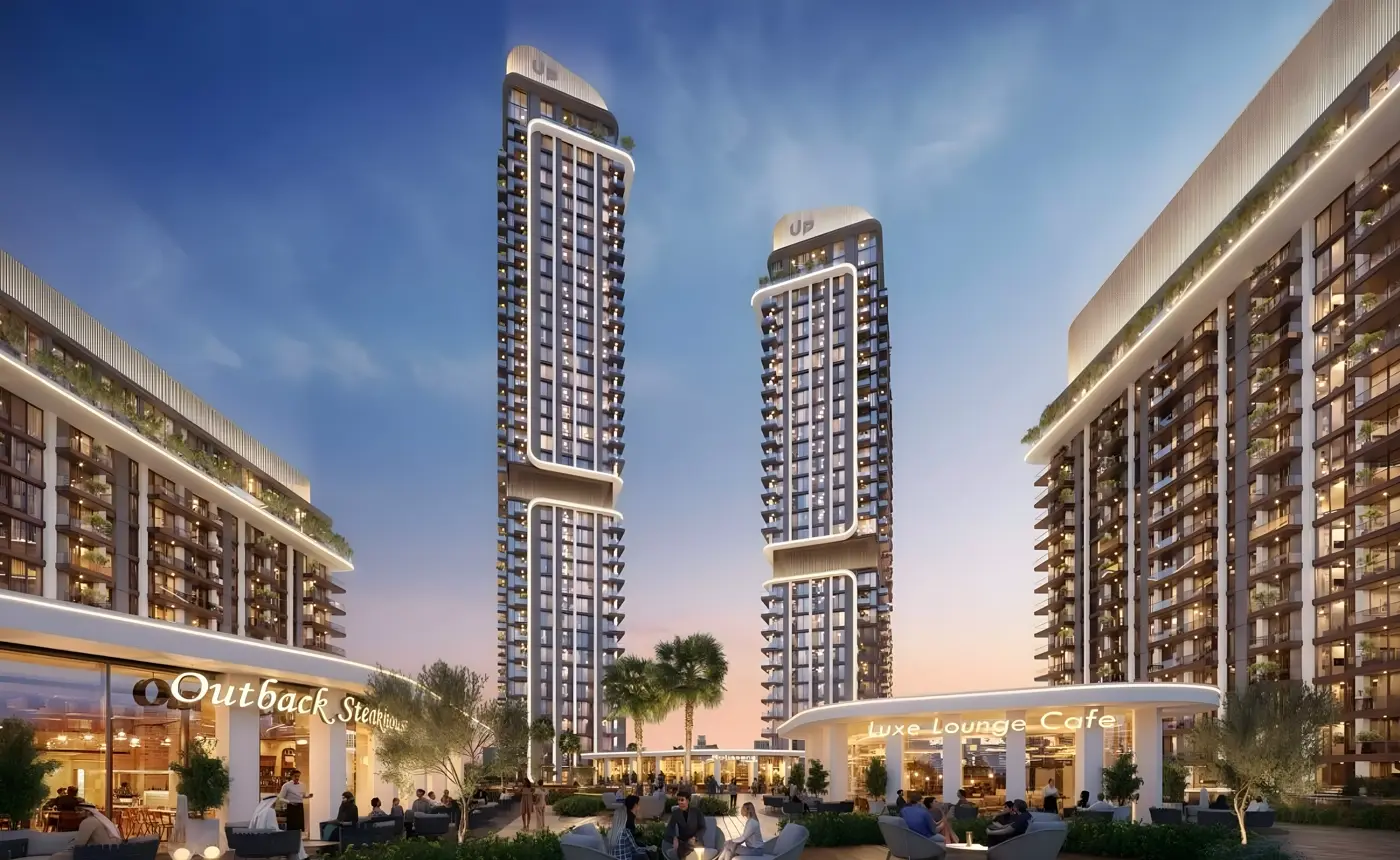 Mirdad Motor City — podium plaza marketing still with twin UP towers and F&B frontage
