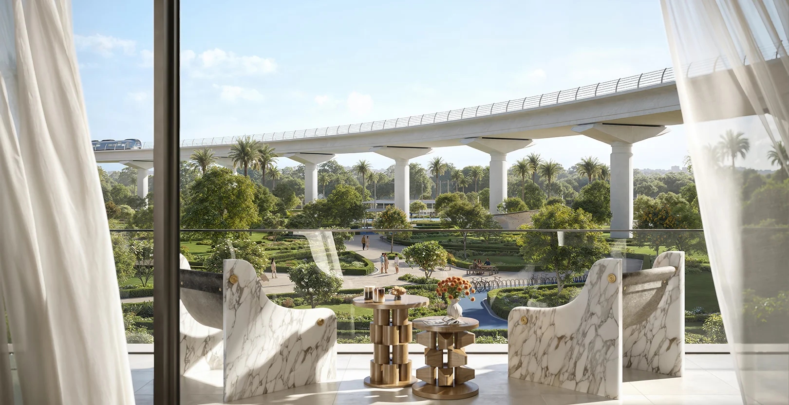 Montiva by Vida at Dubai Creek Harbour — interior balcony view toward green park and metro line