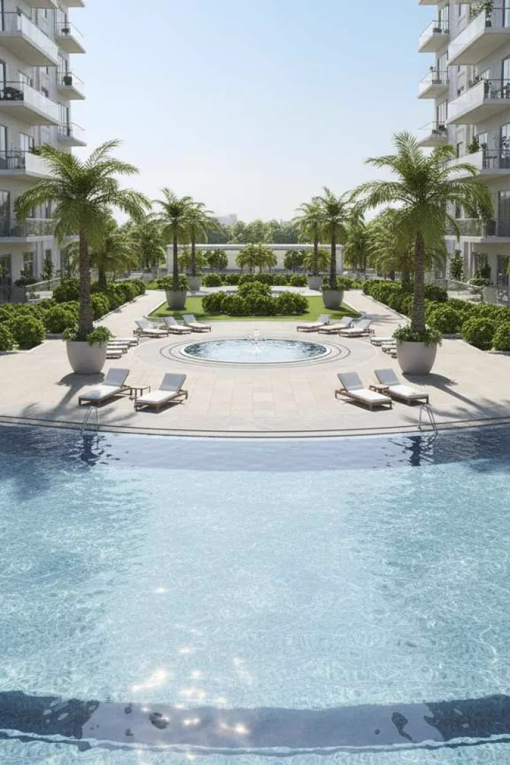 Noble Crest Residences — brochure courtyard pool and fountain between the towers