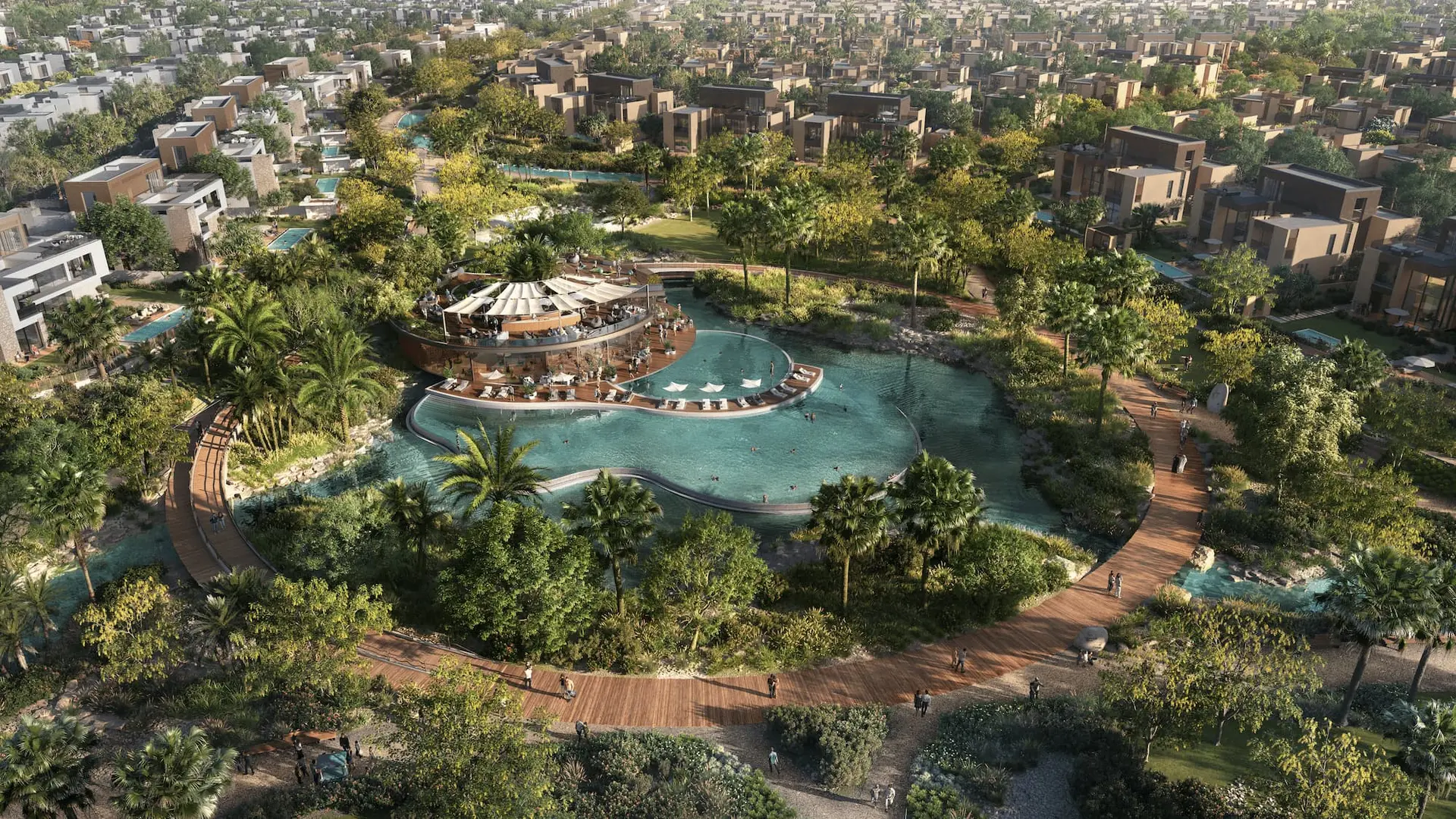 Haven by Aldar — aerial marketing still of landscaped lagoon and low-rise villa cluster (Oasis CGI series)