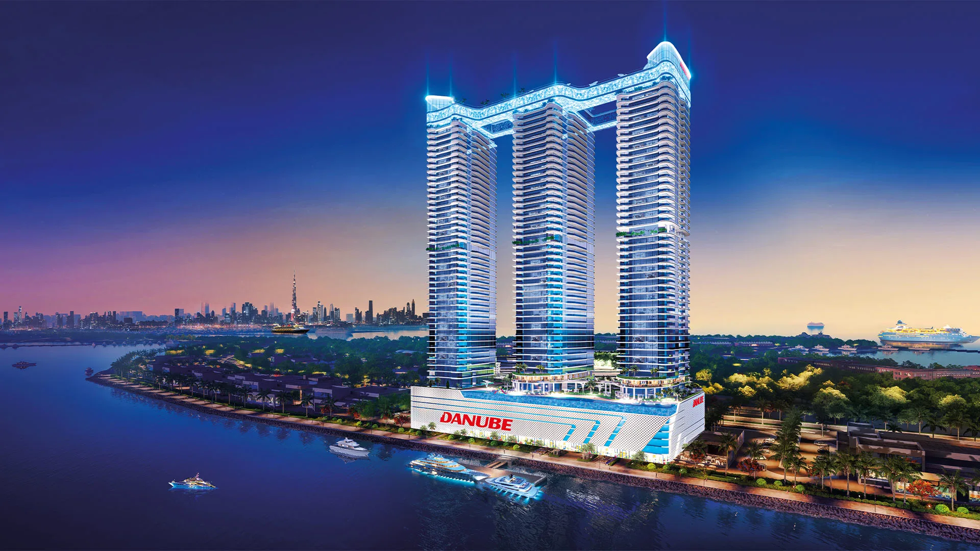 Oceanz by Danube — night exterior marketing render