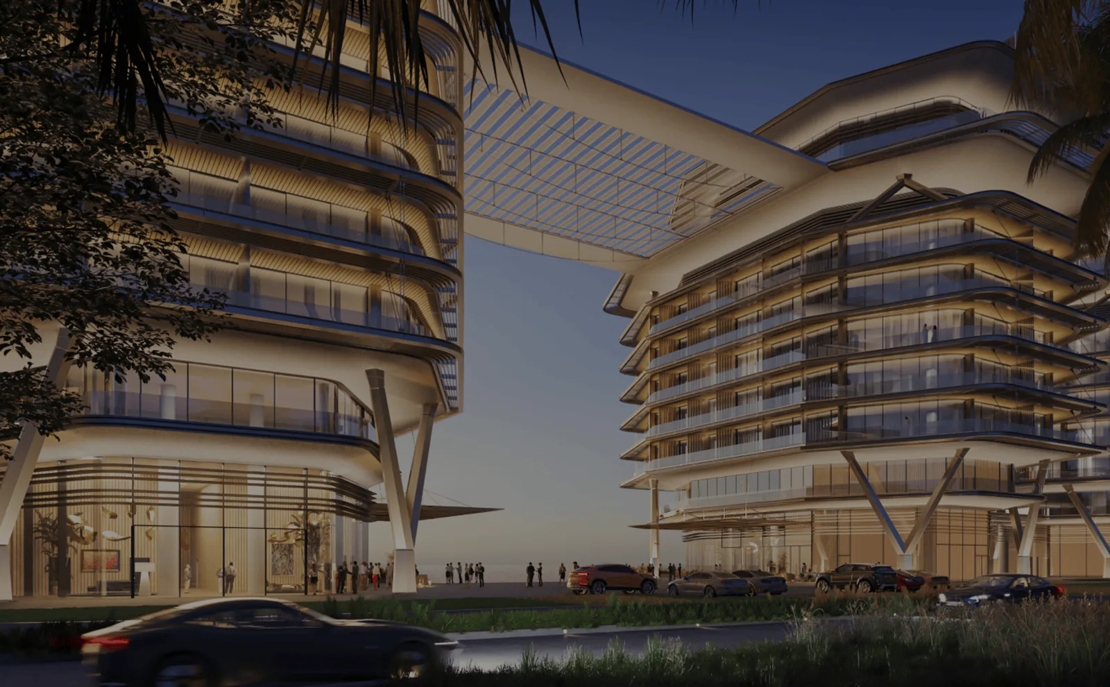 Peninsula Dubai Residences — official dusk street still of stacked-terrace blocks linked by a sky-bridge