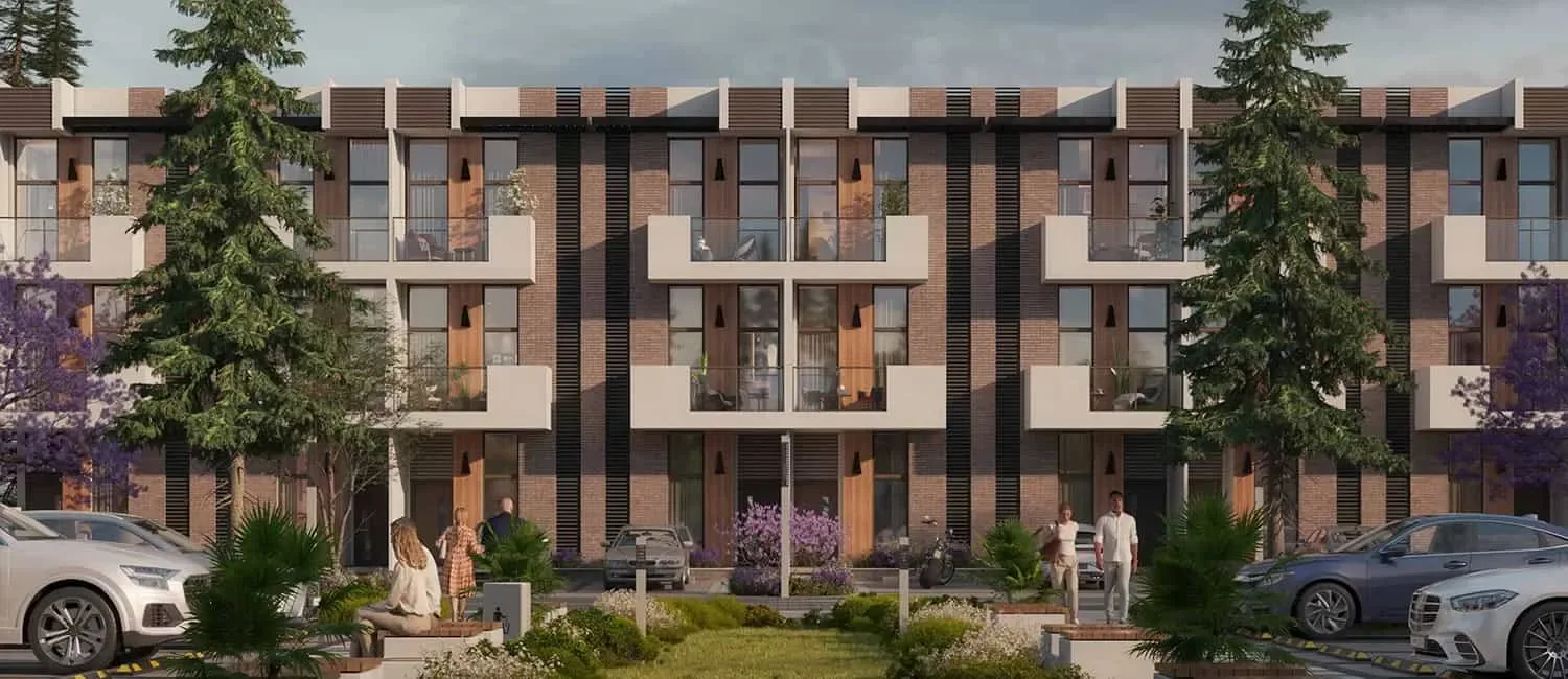R. Hills — official living-page facade of brick-and-wood townhouse bays with pines