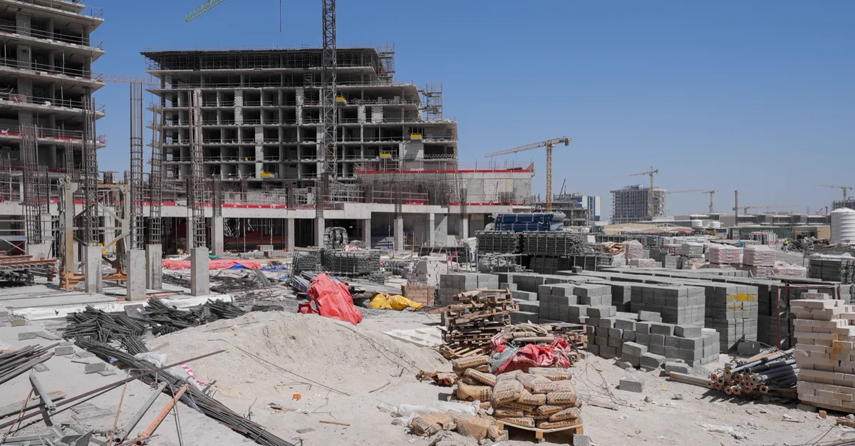 Beach Residences at Rixos Dubai Islands — official Nakheel construction still of mid-rise concrete frames on site