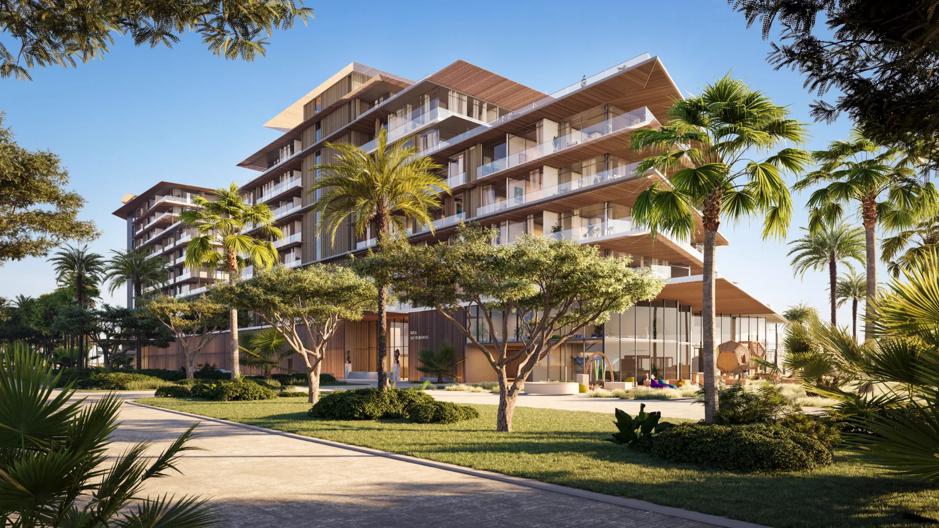 Rixos Dubai Islands Beach Residences — official Nakheel street-level still of a stacked-terrace mid-rise with timber soffits and a glazed lobby