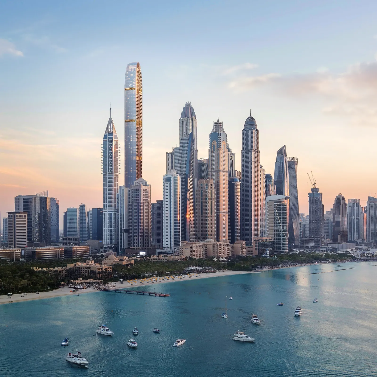 Six Senses Residences Dubai Marina — coastal skyline marketing still of the slender tower among Marina high-rises