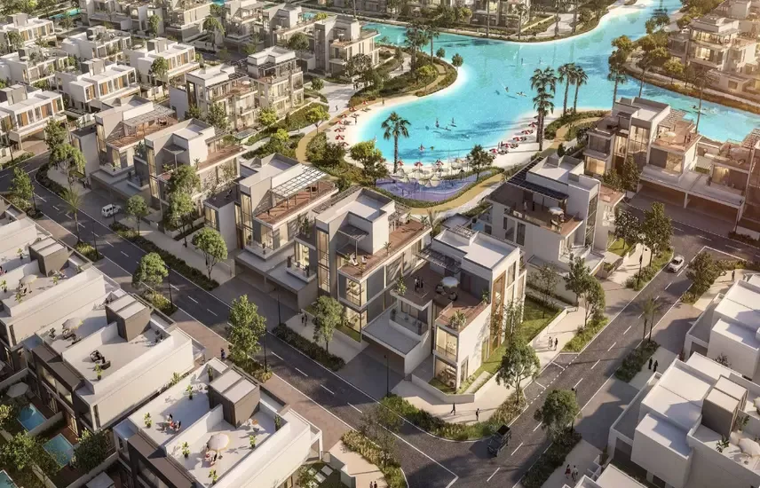 South Bay Phase 5 Dubai South — Property Finder gallery aerial of villa streets beside the crystal lagoon