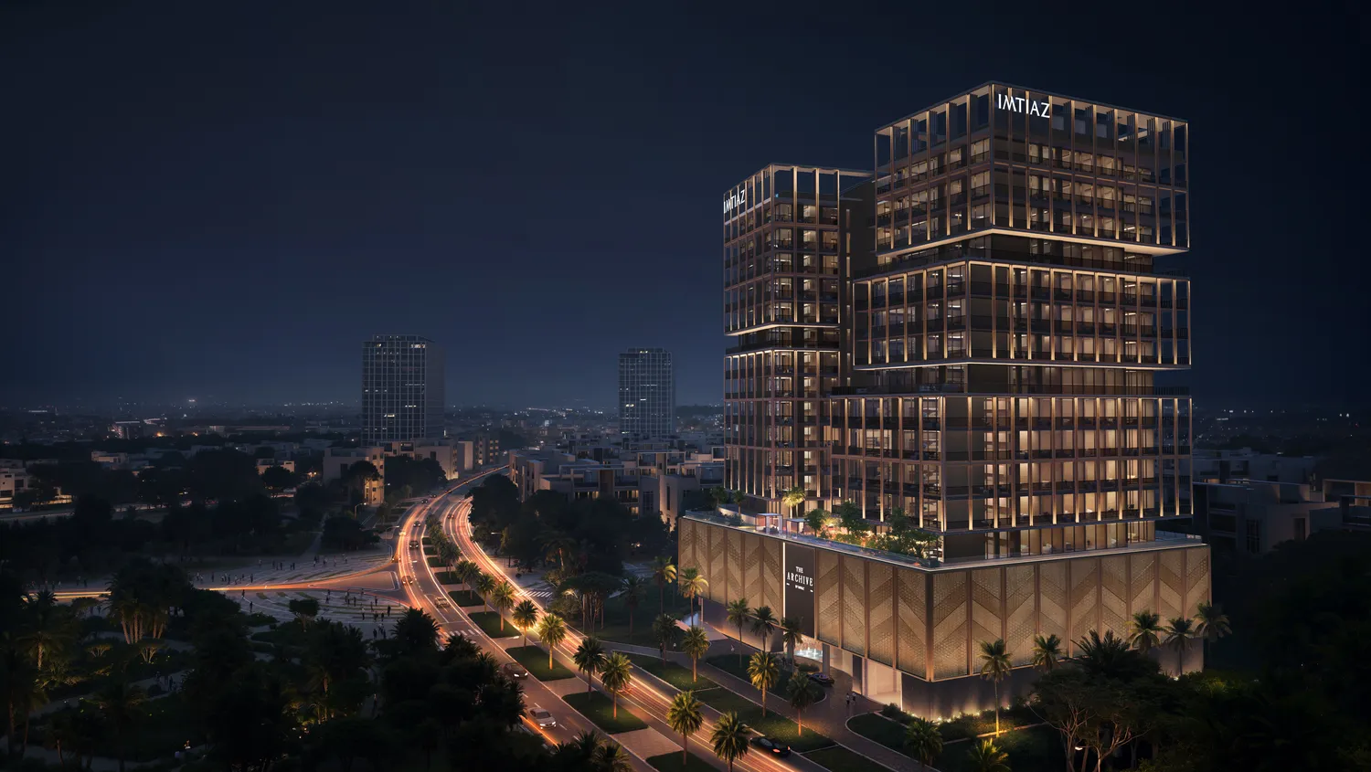 The Archive by Imtiaz — official night exterior marketing still with THE ARCHIVE podium beside a highway
