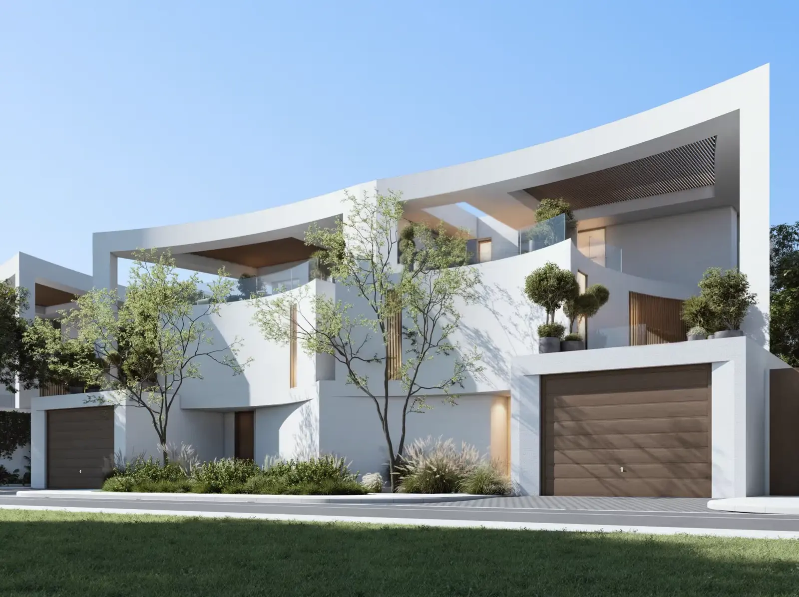 The Dune at Lunaya — official street elevation of paired white duet homes with brown garage doors and planted terraces
