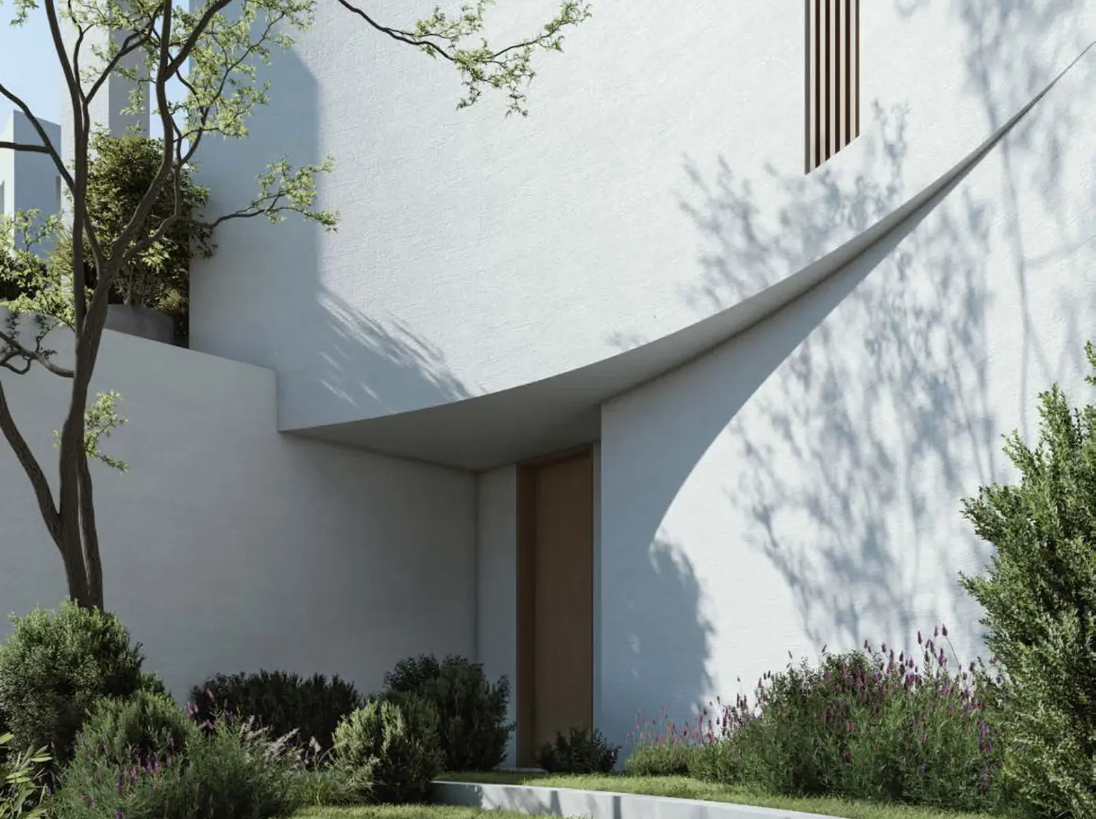 The Dune at Lunaya — official entrance still with curved white wall and timber door