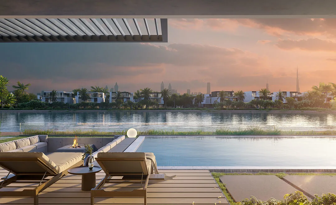 The Sanctuary by Ellington — official terrace looking over the lagoon toward the Dubai skyline