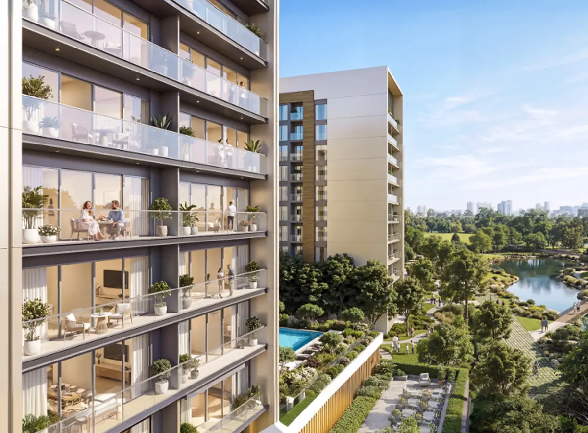 The Woods Abode — balcony stack looking over a landscaped park and pond, marketing still