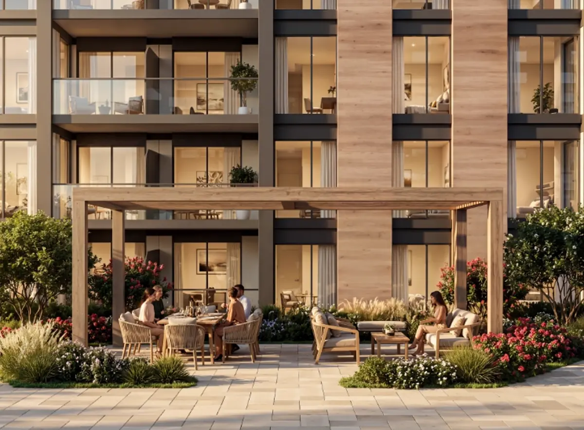 The Woods Abode — podium dining terrace against the apartment elevation, marketing still