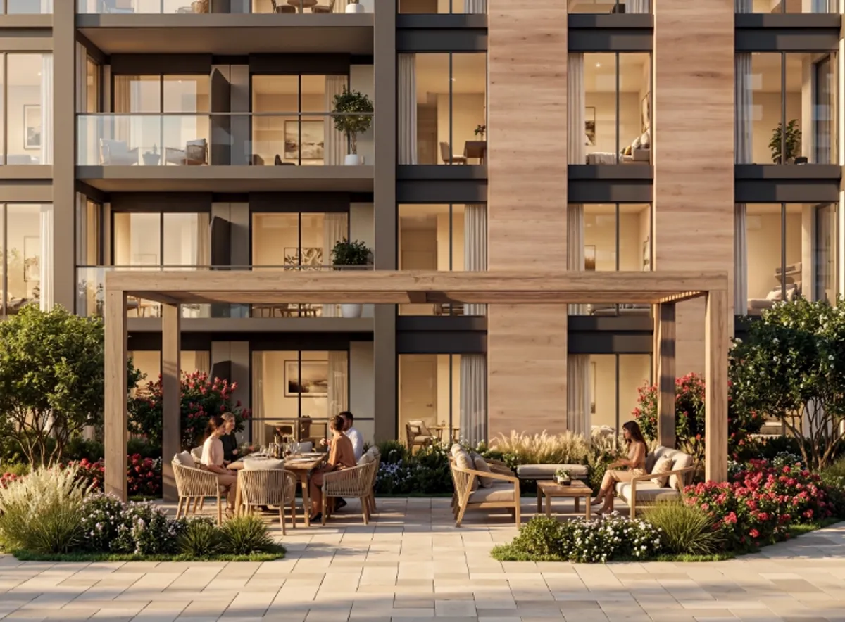 The Woods Retreat — podium dining terrace against the apartment elevation, marketing still