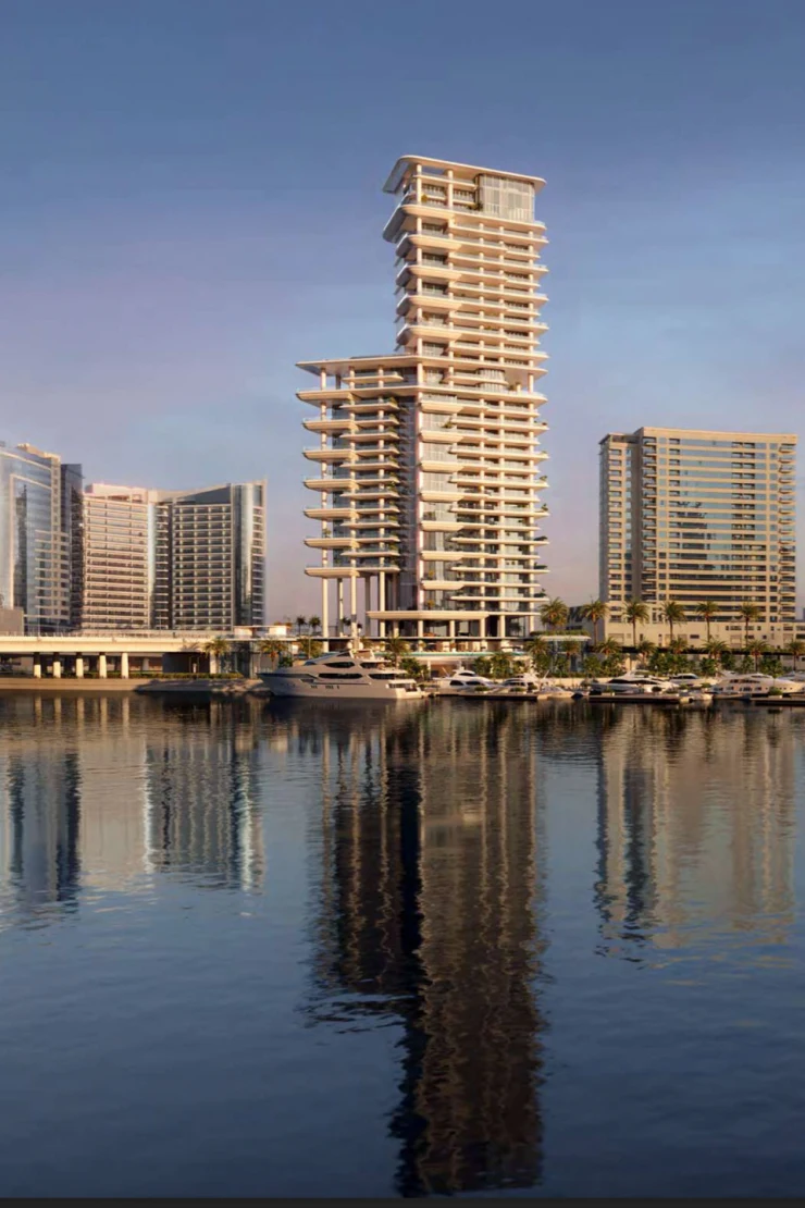 VELA — full-tower waterfront marketing still from the marina, stacked terrace plates and offset Sky Palace crown